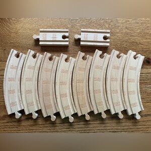 8 curved train track pieces and 2 (3.5 inch) straight pieces.
